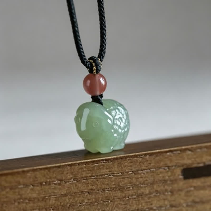 Buddha Stones Collana con cordino intrecciato e decorazione protettiva a forma di pecora intagliata a mano in giada. - image 1