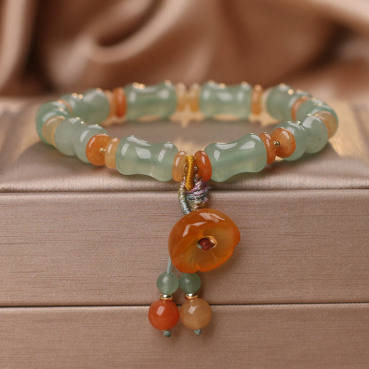 Braccialetto della fortuna con motivo a fiori di bambù e giada naturale Buddha Stones