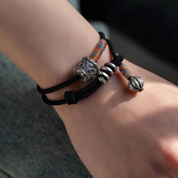 Braccialetto a doppio giro con amuleto intagliato in Buddha Stones tibetano Om Mani Padme Hum