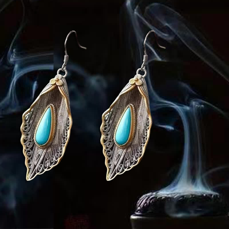 Orecchini pendenti con motivo a foglia di Bodhi in argento sterling 925 con Buddha Stones e turchese