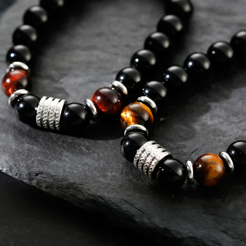 Bracciale Buddha Stones in ossidiana nera naturale con occhio di tigre e forza