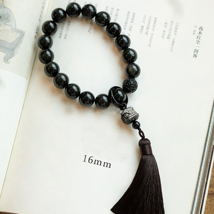 Buddha Stones Argento naturale Ossidiana lucida Ossidiana nera Leone Mala da polso Protezione Nappe Mala tascabile Decorazione per auto