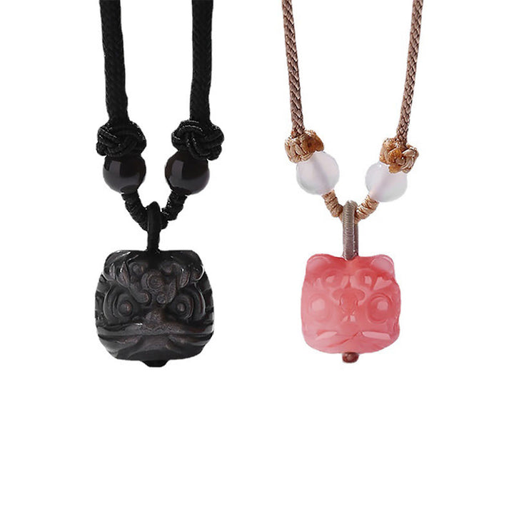 Collana con ciondolo di protezione leone danzante in agata rossa e ossidiana lucida in argento naturale Buddha Stones