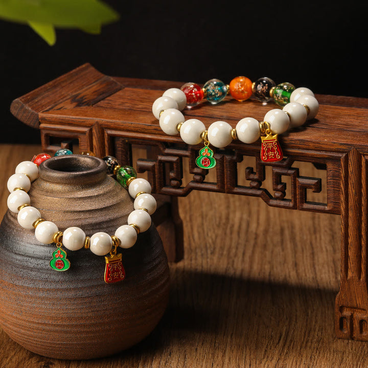 Buddha Stones, incenso tibetano, cenere, porcellana, perlina di vetro fluorescente luminosa, moneta di rame, ciondolo, braccialetto della pace