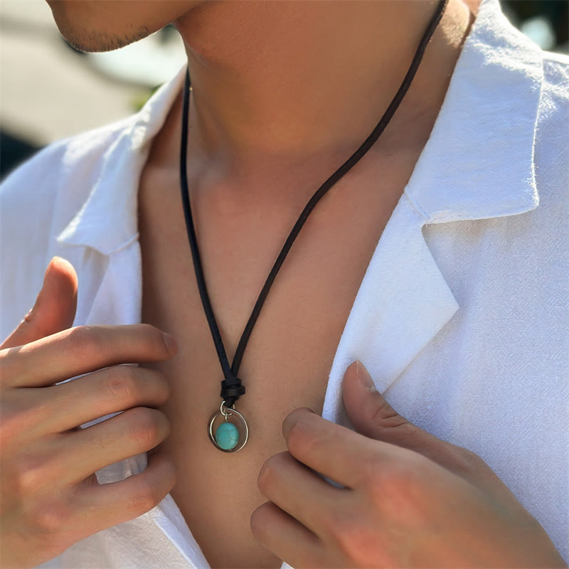 Collana con ciondolo in pietra turchese rotonda con pietre Buddha Stones e forza di protezione