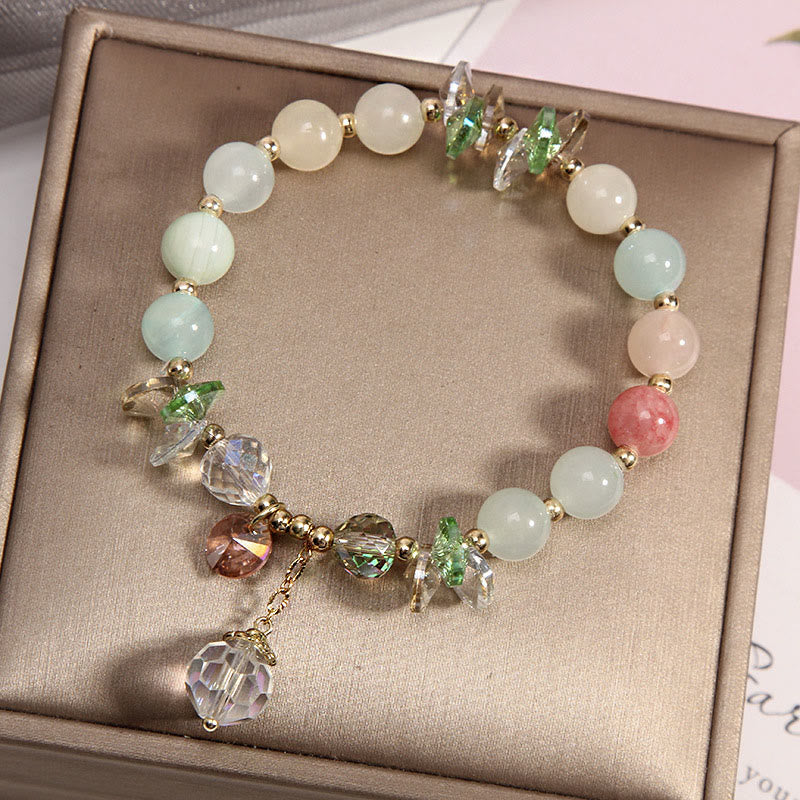 Braccialetto con ciondolo di pace in cristallo rosa con occhio di gatto Buddha Stones