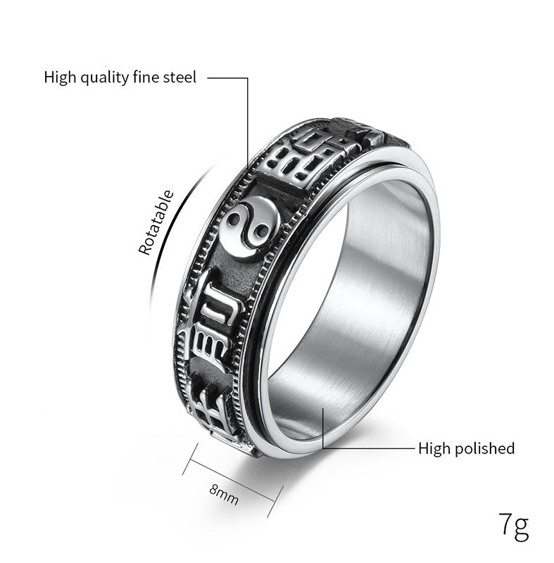 Anello girevole in acciaio al titanio con parole in equilibrio e calma