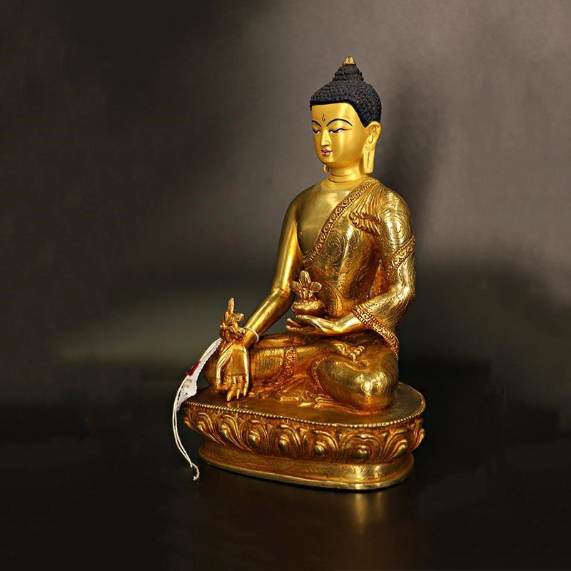 Statua di Buddha Shakyamuni Buddha della medicina Compassione in rame placcato oro Decorazione