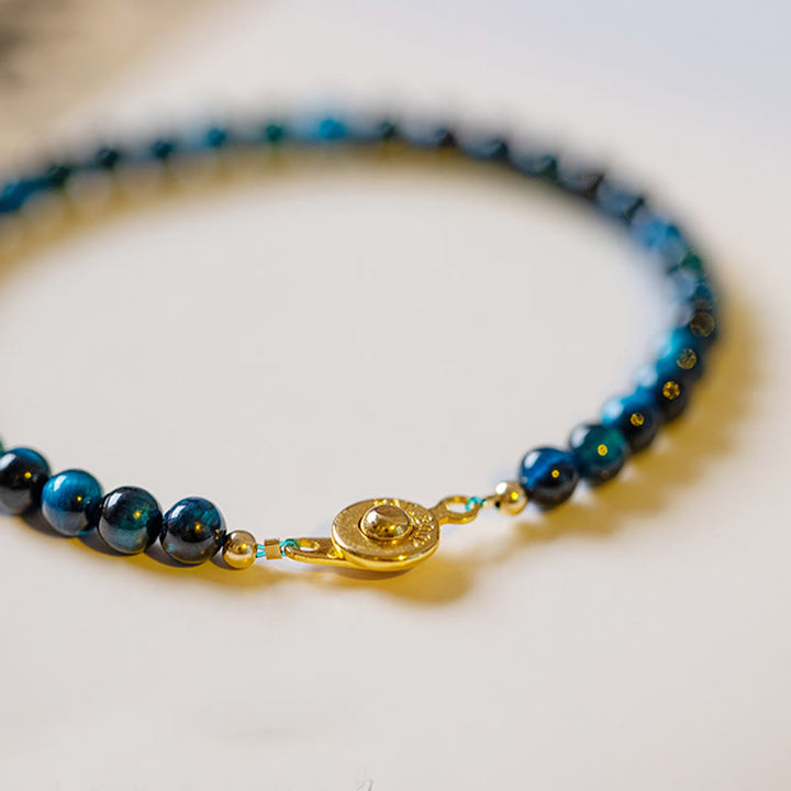 Braccialetto di protezione con catena in pietra naturale occhio di tigre blu Buddha Stones