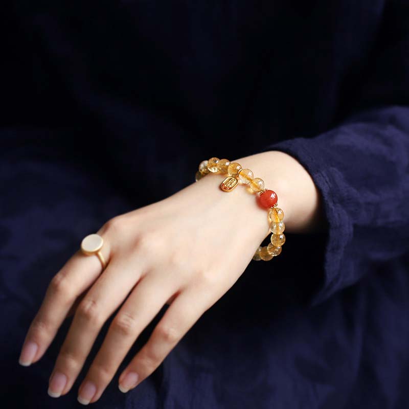 Braccialetto con ciondolo della fortuna in agata rossa e citrino Buddha Stones