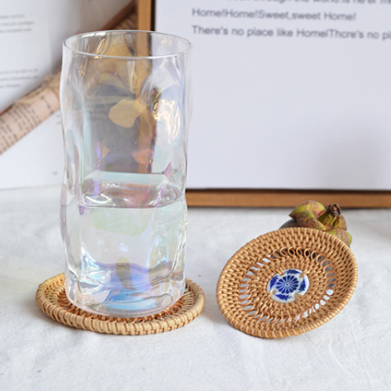 Sottobicchiere per tazza da tè in rattan con motivo floreale in ceramica