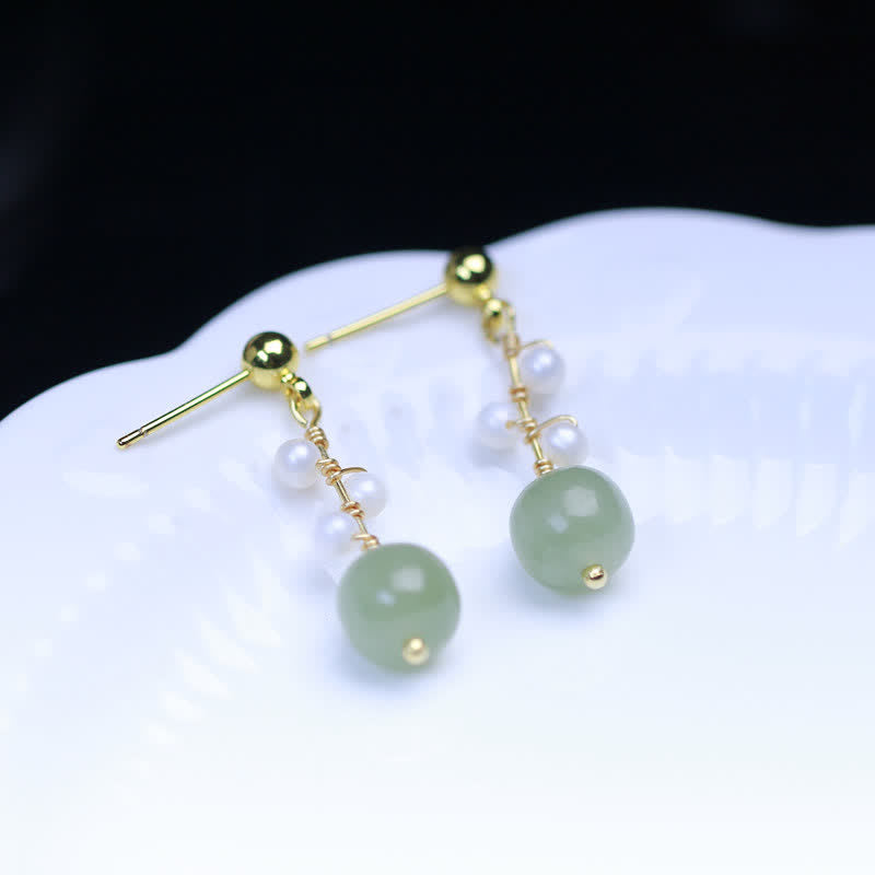 Orecchini pendenti con motivo floreale in giada Hetian placcati in oro 14K