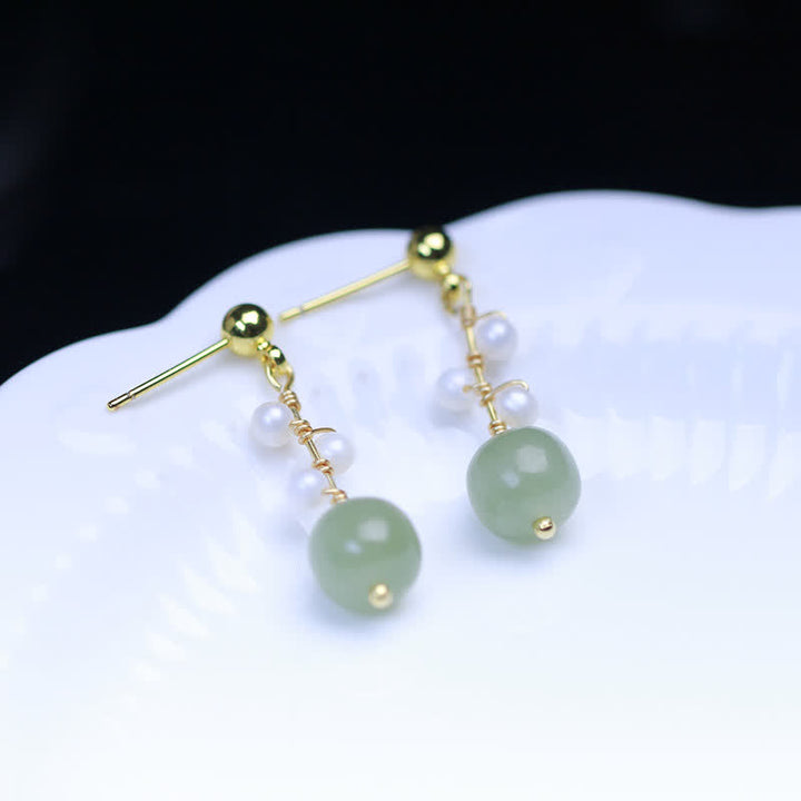 Orecchini pendenti con motivo floreale in giada Hetian placcati in oro 14K