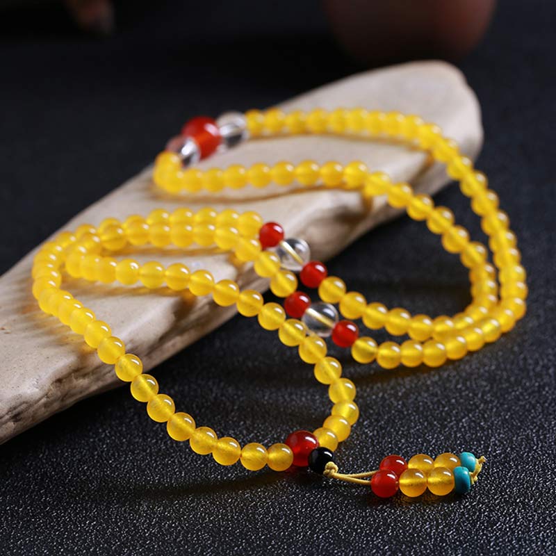 Braccialetto dell'armonia Buddha Stones 108 Mala Beads in calcedonio giallo