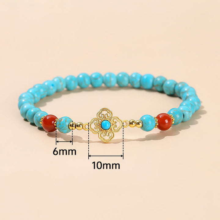 Braccialetto di protezione dell'equilibrio con perline turchesi Buddha Stones