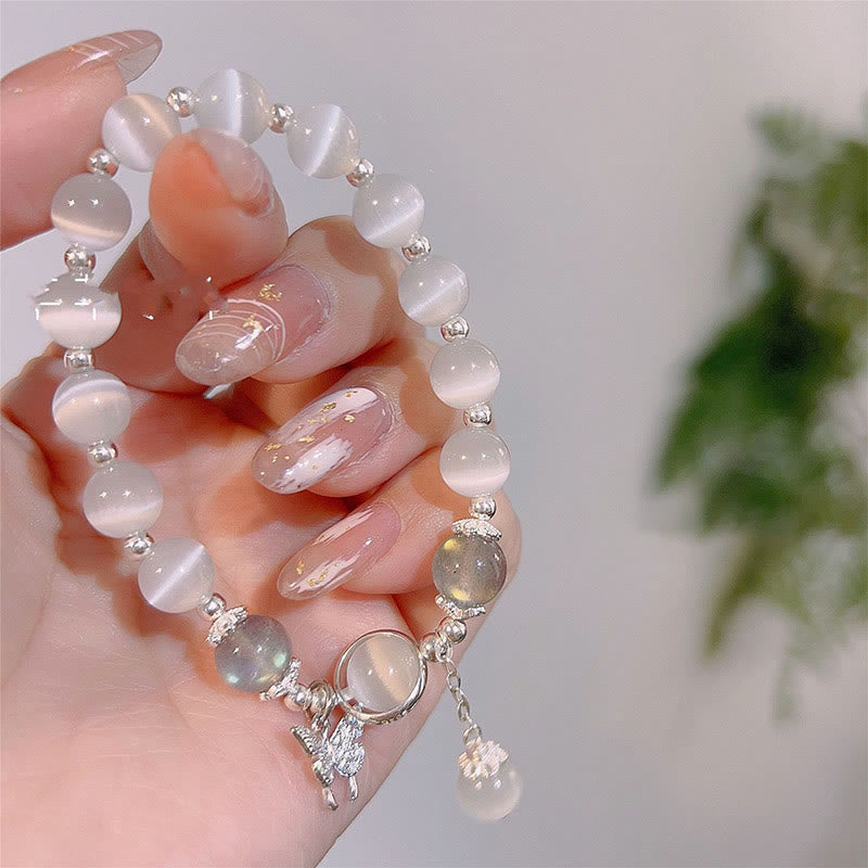 Braccialetto di supporto con ciondolo a forma di stella a forma di farfalla, pietra di luna e occhio di gatto Buddha Stones
