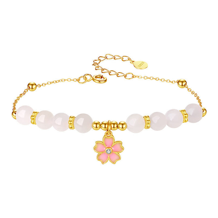 Braccialetto di protezione in giada bianca Hetian con fiori di ciliegio in argento sterling 925 Buddha Stones