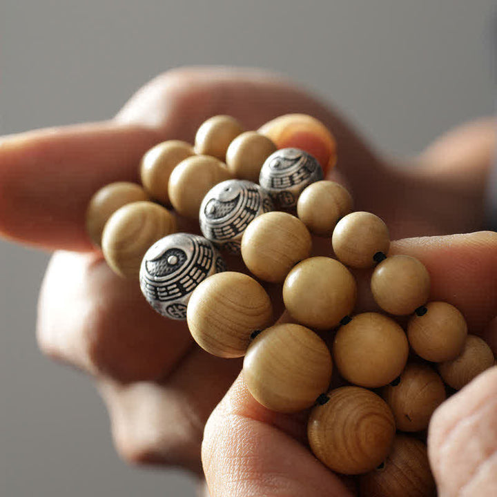 Bracciale di ricchezza e fortuna di legno di pesca del Tibet, loto, cinabro, Bagua Yin Yang
