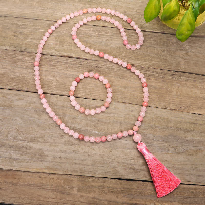 Braccialetto con nappa di cristallo rosa e 108 perle di Mala Buddha Stones