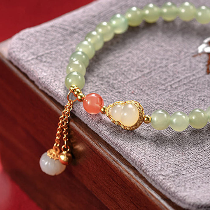 Braccialetto portafortuna in argento sterling 925 con giada Hetian e zucca di loto
