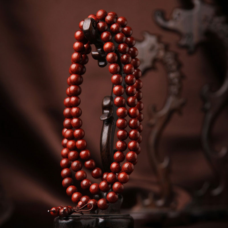 Braccialetto di meditazione Mala con 108 perle di legno di sandalo rosso e foglie piccole tibetane Buddha Stones