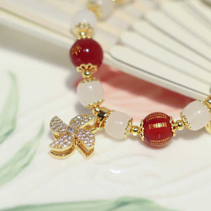 Braccialetto di benedizione con ciondolo a forma di lucchetto cinese con mulino a vento Buddha Stones Fu Character