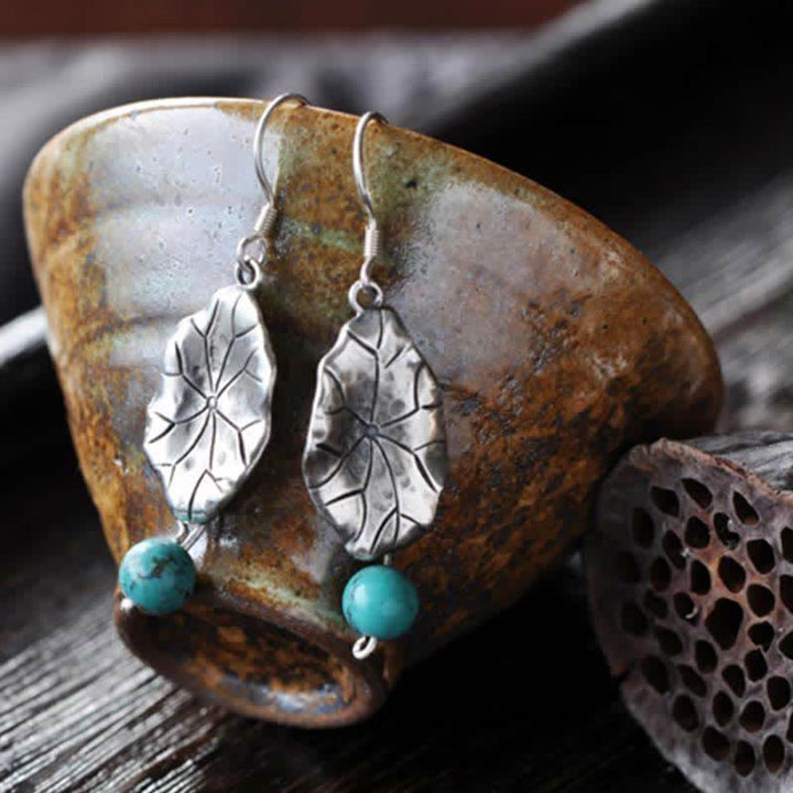 Orecchini pendenti con protezione a forma di foglia di loto turchese in argento sterling 925 Buddha Stones