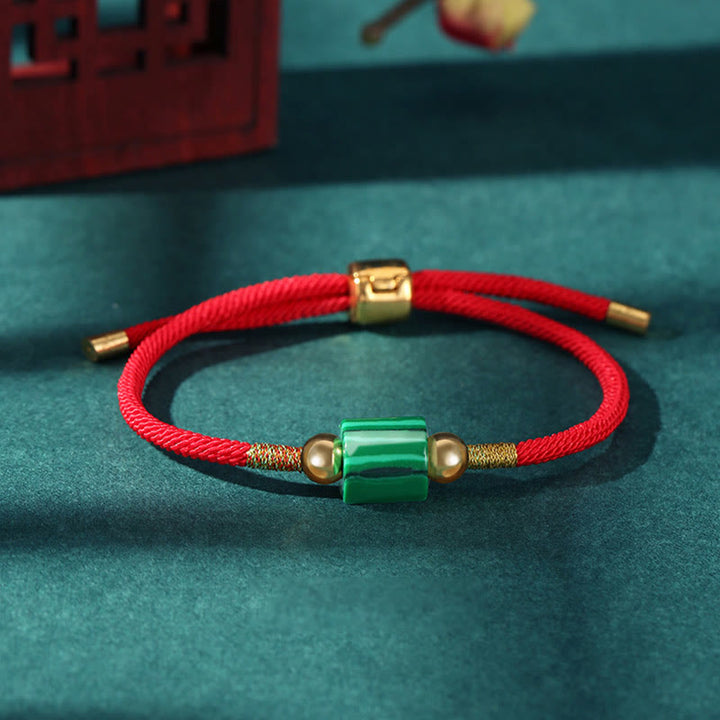 Braccialetto in corda intrecciata con protezione dalla fortuna in malachite, fatto a mano in Tibet, con Buddha Stones verde e pietra rossa