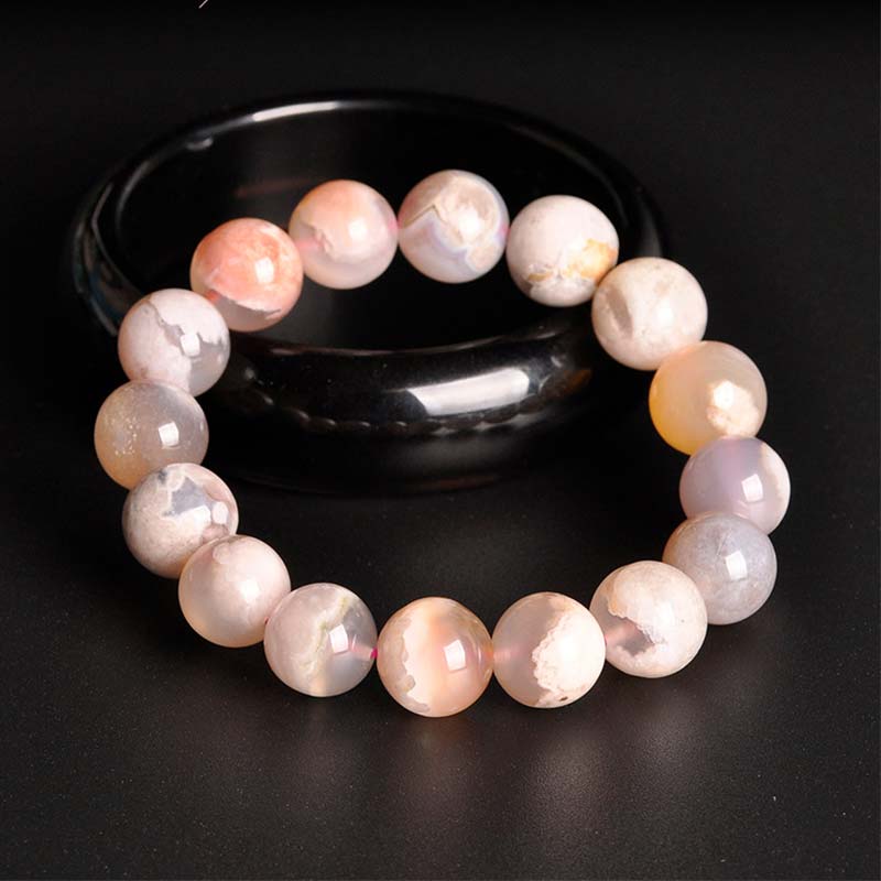 Braccialetto di benedizione della pace in agata sakura Buddha Stones