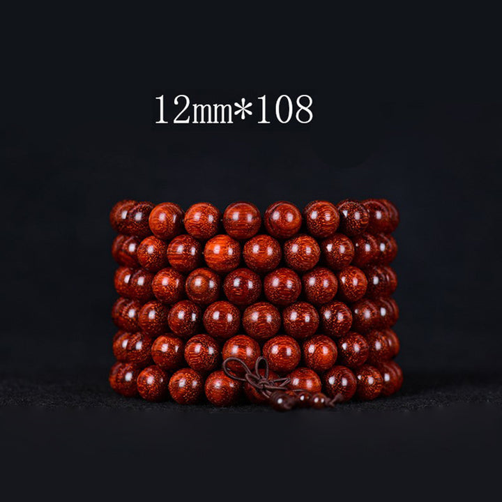 Braccialetto di equilibrio in legno di sandalo rosso con foglia piccola tibetana Buddha Stones