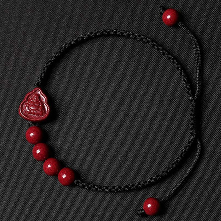 Bracciale con cordino di benedizione Buddha Stones che ride Buddha Avalokitesvara cinabro
