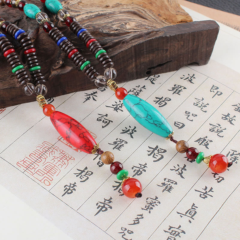 Collana con ciondolo in pietra turchese, pietra di legno di wenge, protezione e calma Buddha Stones