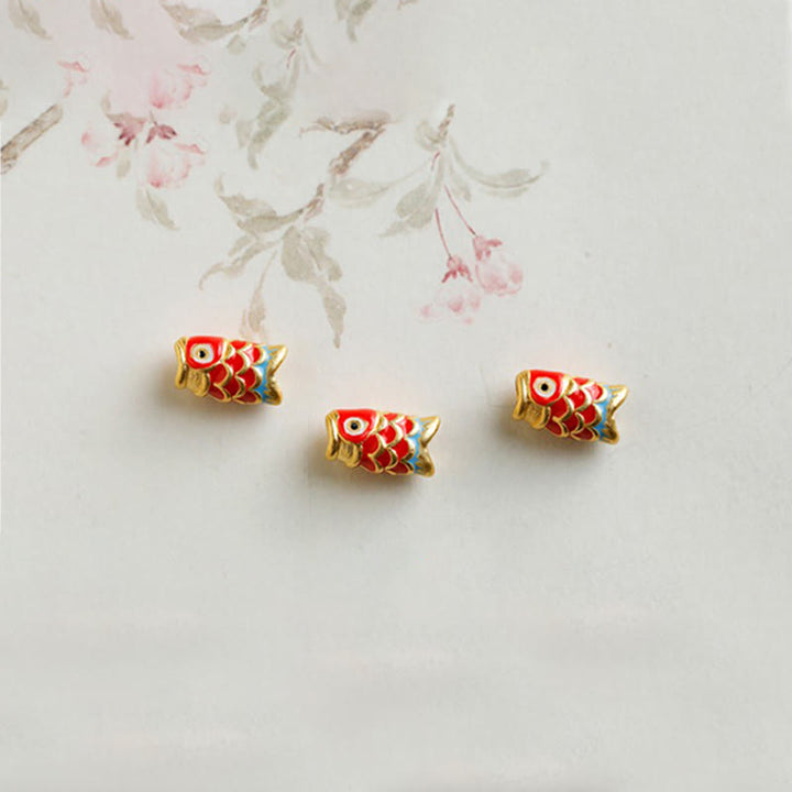 Braccialetto di protezione in granato naturale con pesce koi in oro 999 Buddha Stones