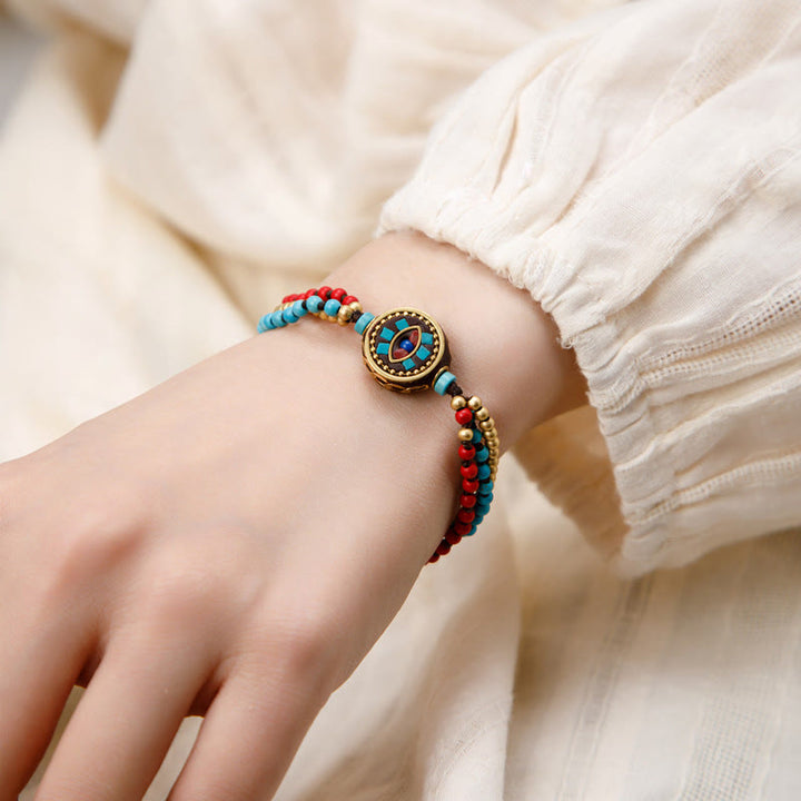 Braccialetto di protezione e forza Buddha Stones in turchese tibetano Om Mani Padme Hum