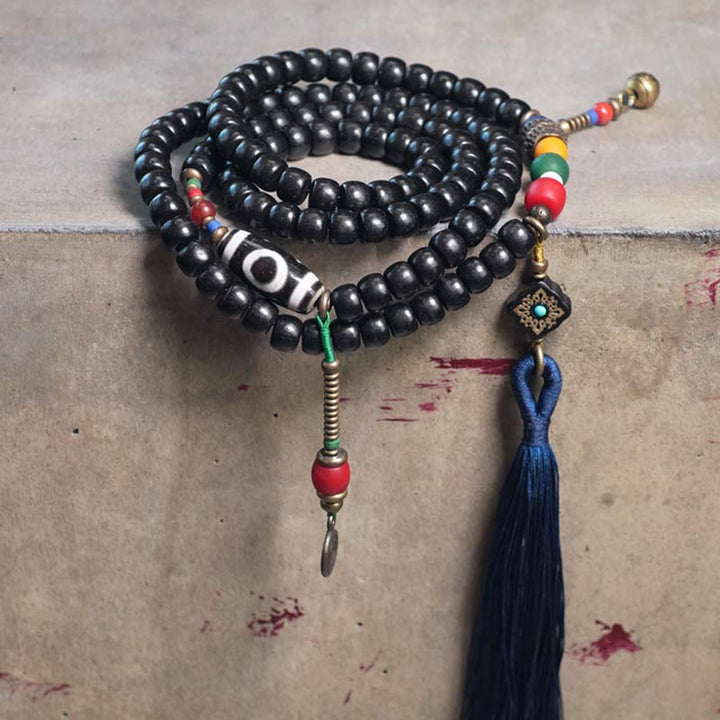 Buddha Stones 108 Perline Mala Legno di Ebano Dzi Perline Rame Braccialetto con Nappa