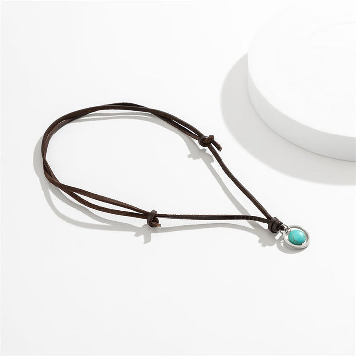 Collana con ciondolo in pietra turchese rotonda con pietre Buddha Stones e forza di protezione