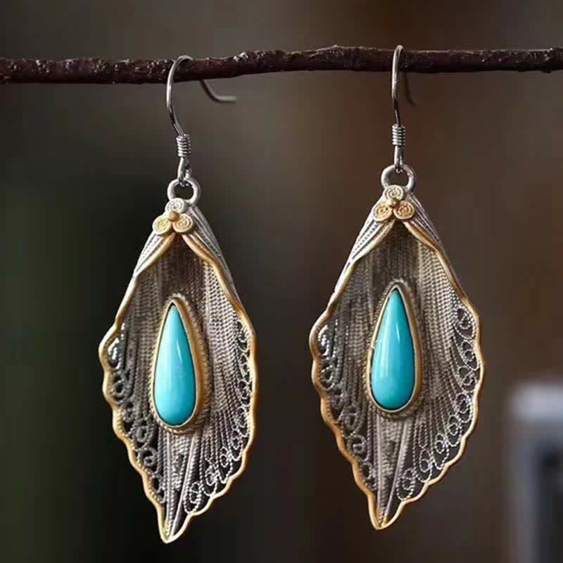 Orecchini pendenti con motivo a foglia di Bodhi in argento sterling 925 con Buddha Stones e turchese