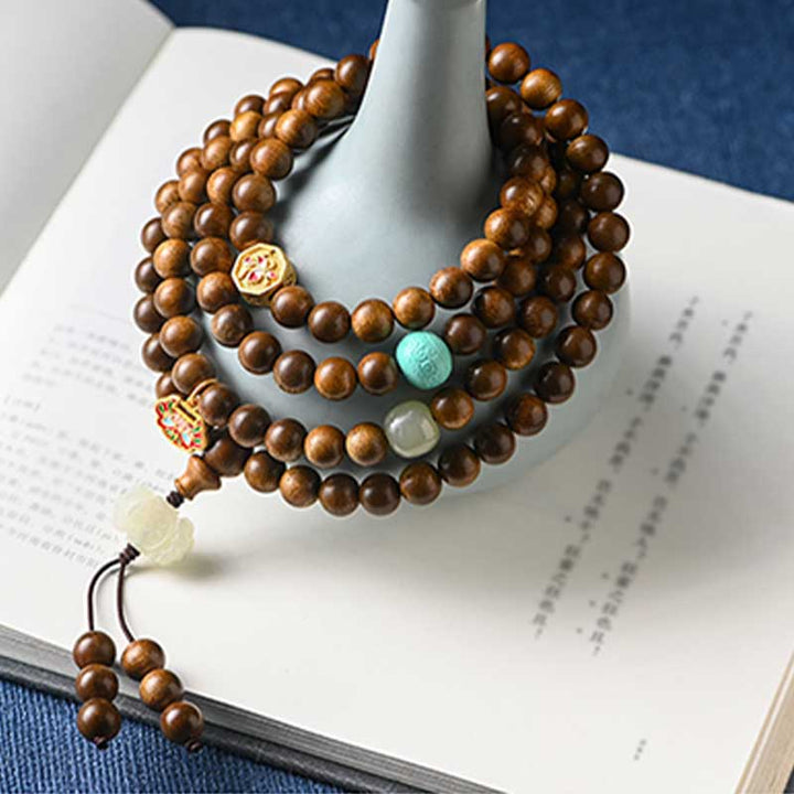 Braccialetto di protezione e calma in palissandro tibetano Buddha Stones Mala