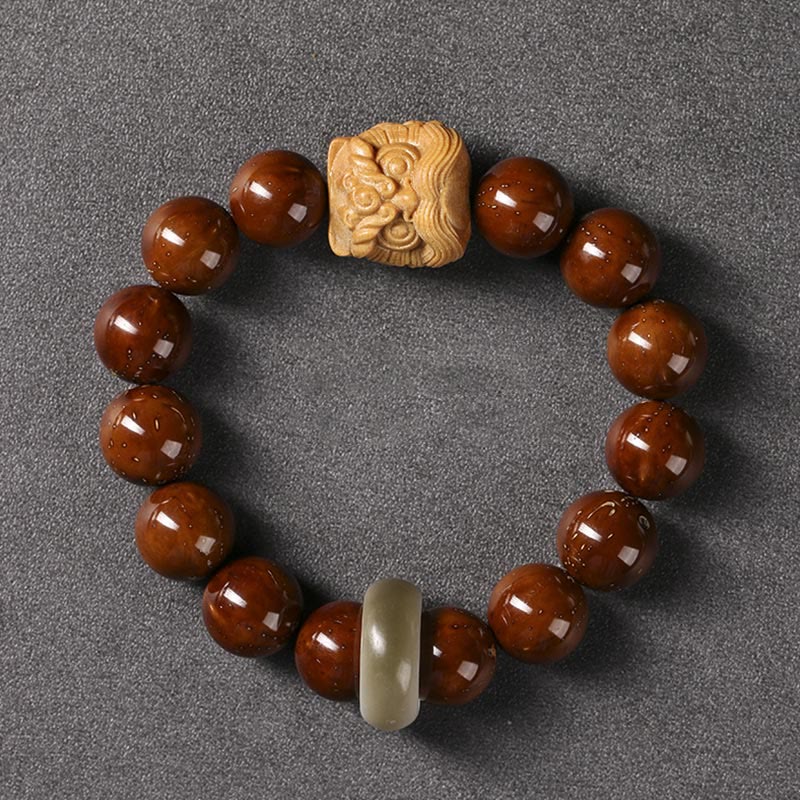 Braccialetto della saggezza del leone danzante dei semi di Bodhi viola Buddha Stones