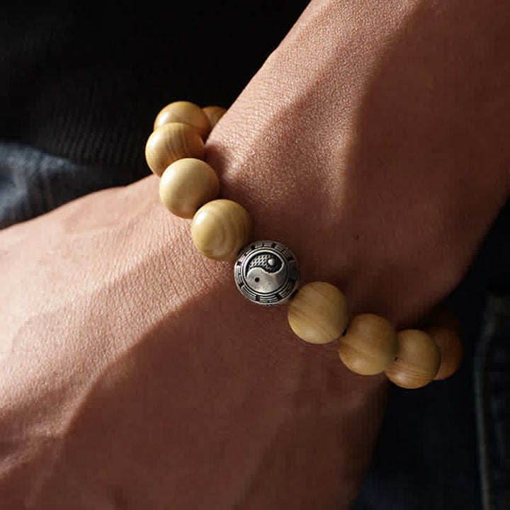 Bracciale di ricchezza e fortuna di legno di pesca del Tibet, loto, cinabro, Bagua Yin Yang