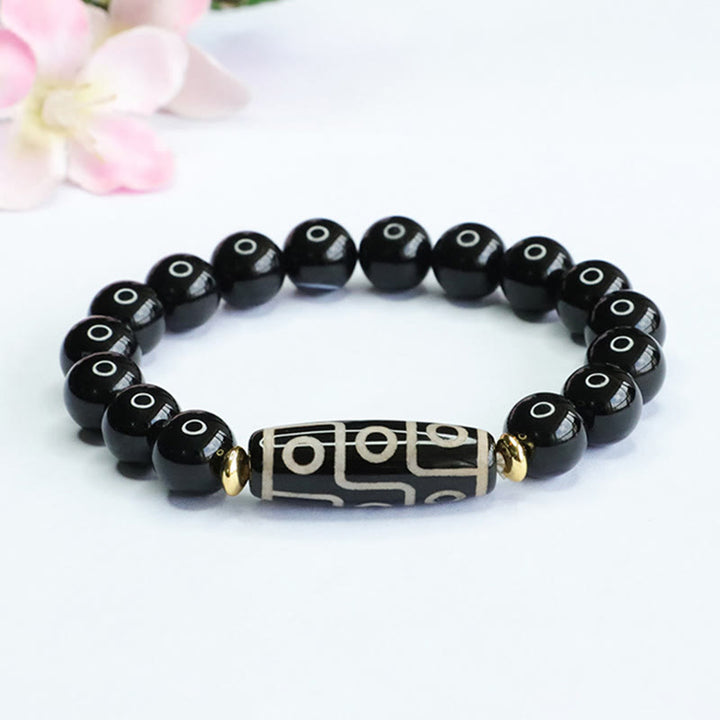 Braccialetto di potere in onice nero con perline Dzi tibetane a nove occhi Buddha Stones