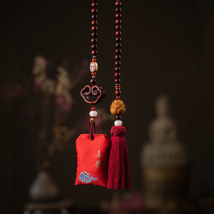 Buddha Stones tibetane piccole foglie di sandalo rosso loto cinabro bustina protezione nappa auto decorazione appesa