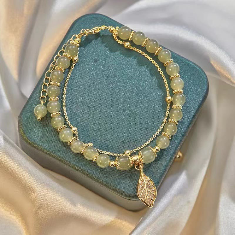 Braccialetto di perline con carattere Fu , Buddha Stones di giada, foglia di ginkgo, tulipano, arachidi e fortuna - image 1