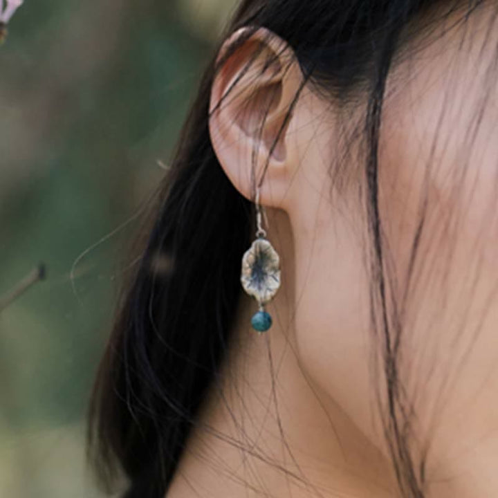 Orecchini pendenti con protezione a forma di foglia di loto turchese in argento sterling 925 Buddha Stones