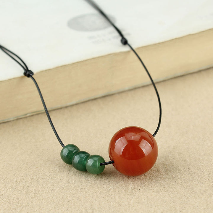 Buddha Stones Agata rossa Avventurina verde Perline di semi di Bodhi verde Collana con ciondolo in corda di cuoio calmo