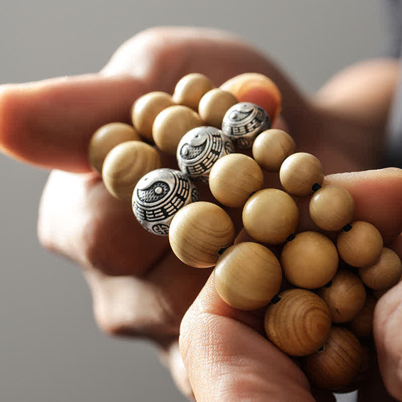Bracciale di ricchezza e fortuna di legno di pesca del Tibet, loto, cinabro, Bagua Yin Yang