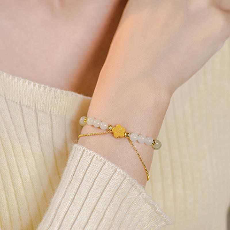 Bracciale Buddha Stones in argento sterling 925 con giada naturale Hetian e fiori di pesco