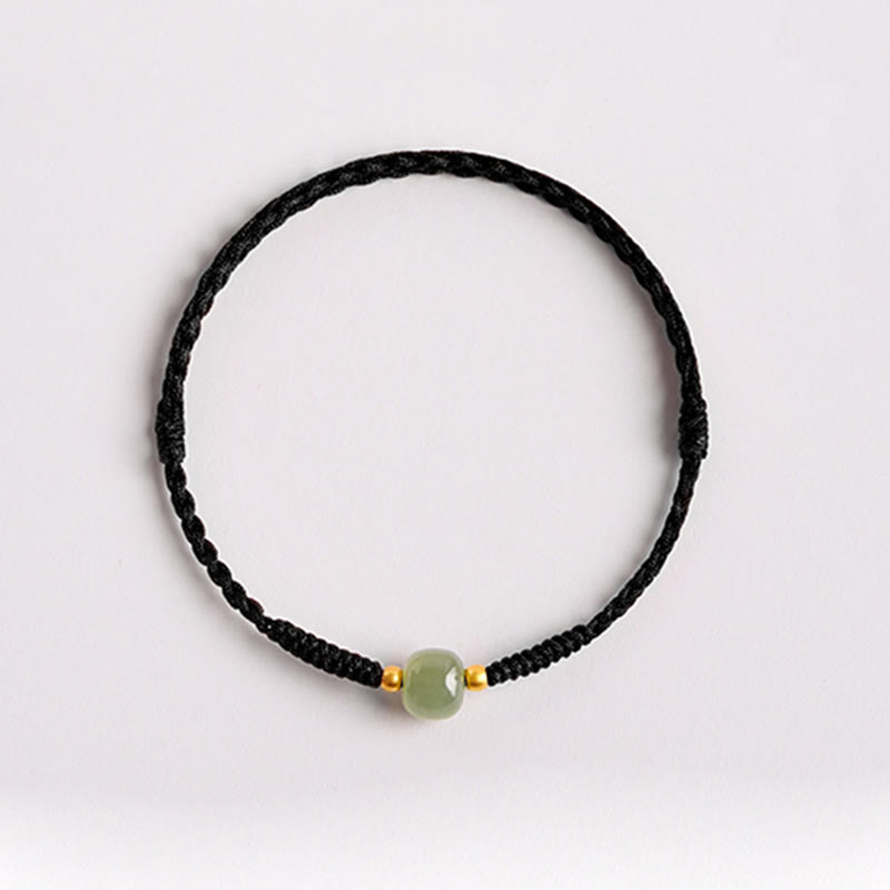 Bracciale intrecciato con Buddha Stones e portafortuna