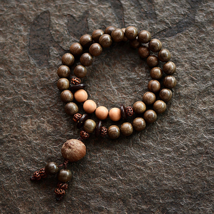 Bracciale Mala con ciondolo di protezione in legno di sandalo tibetano Buddha Stones - Bracciale a doppio giro (17 cm) - 10 mm - image 0