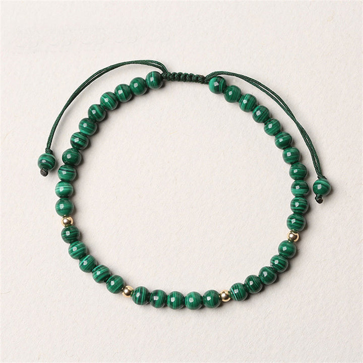 Braccialetto di protezione e calma con Buddha Stones in malachite naturale da 4 mm - image 1